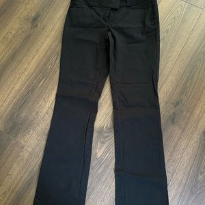 Black straight leg dress pants with stretch fits size 6/8